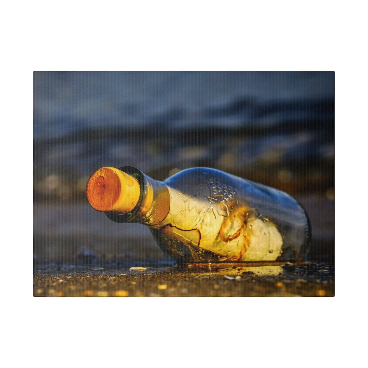 an empty glass bottle sitting on the ground
