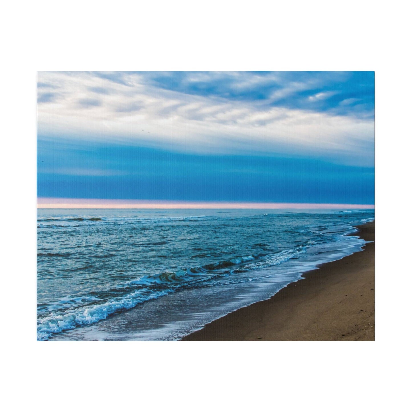 a picture of a beach with waves coming in