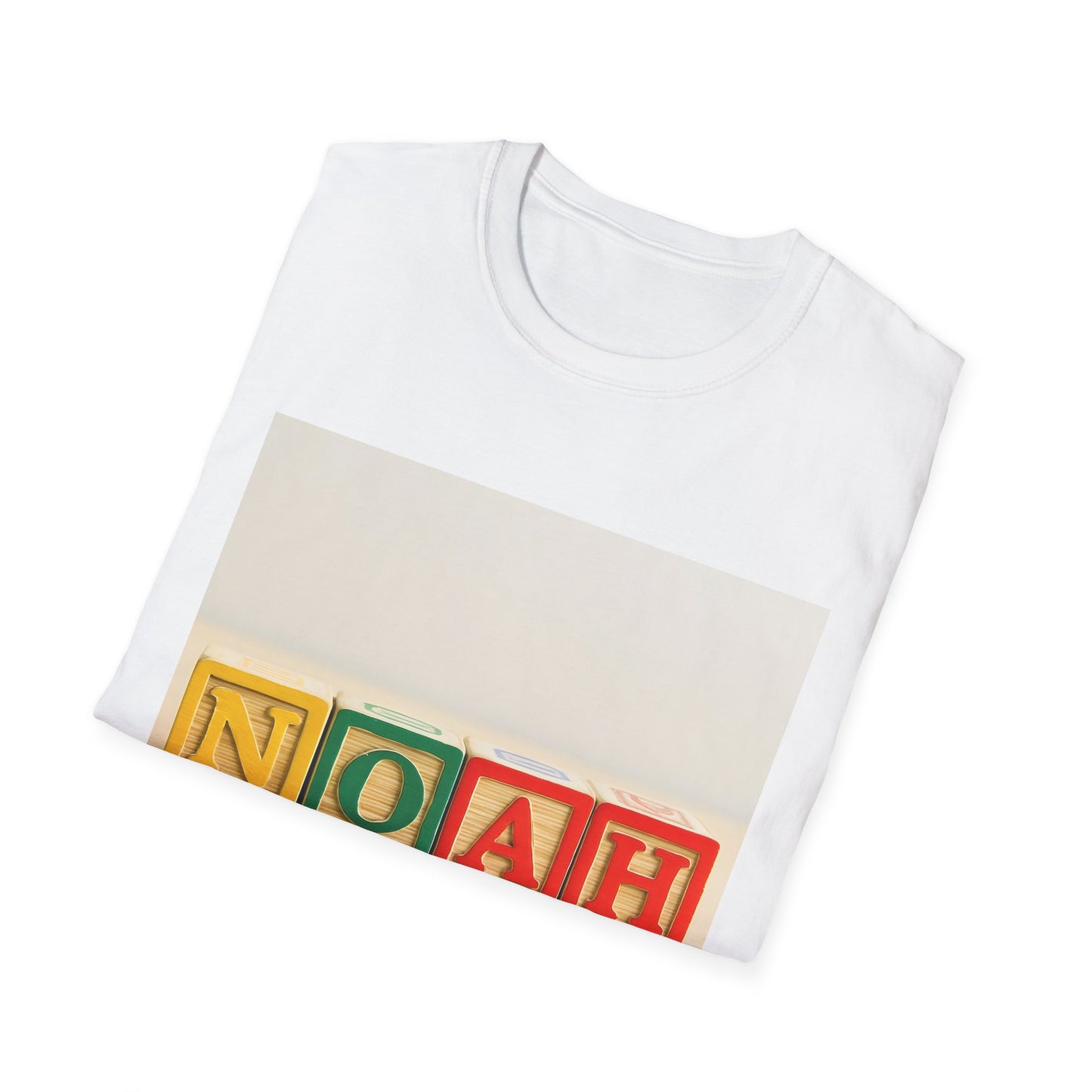 White short-sleeve T-shirt folded with a large photo print of colorful wooden alphabet blocks at the bottom.