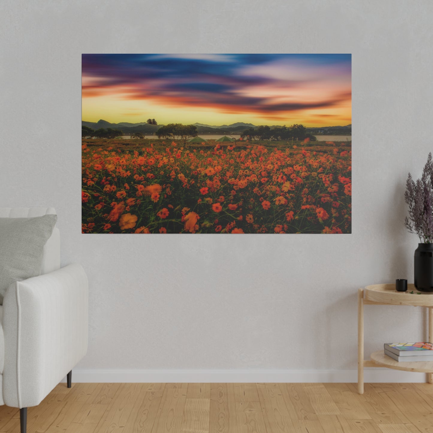 A stunning landscape of flowers at sunset, with the sky lit up in warm hues and the vibrant colors of the blossoms enhanced by the golden light.
