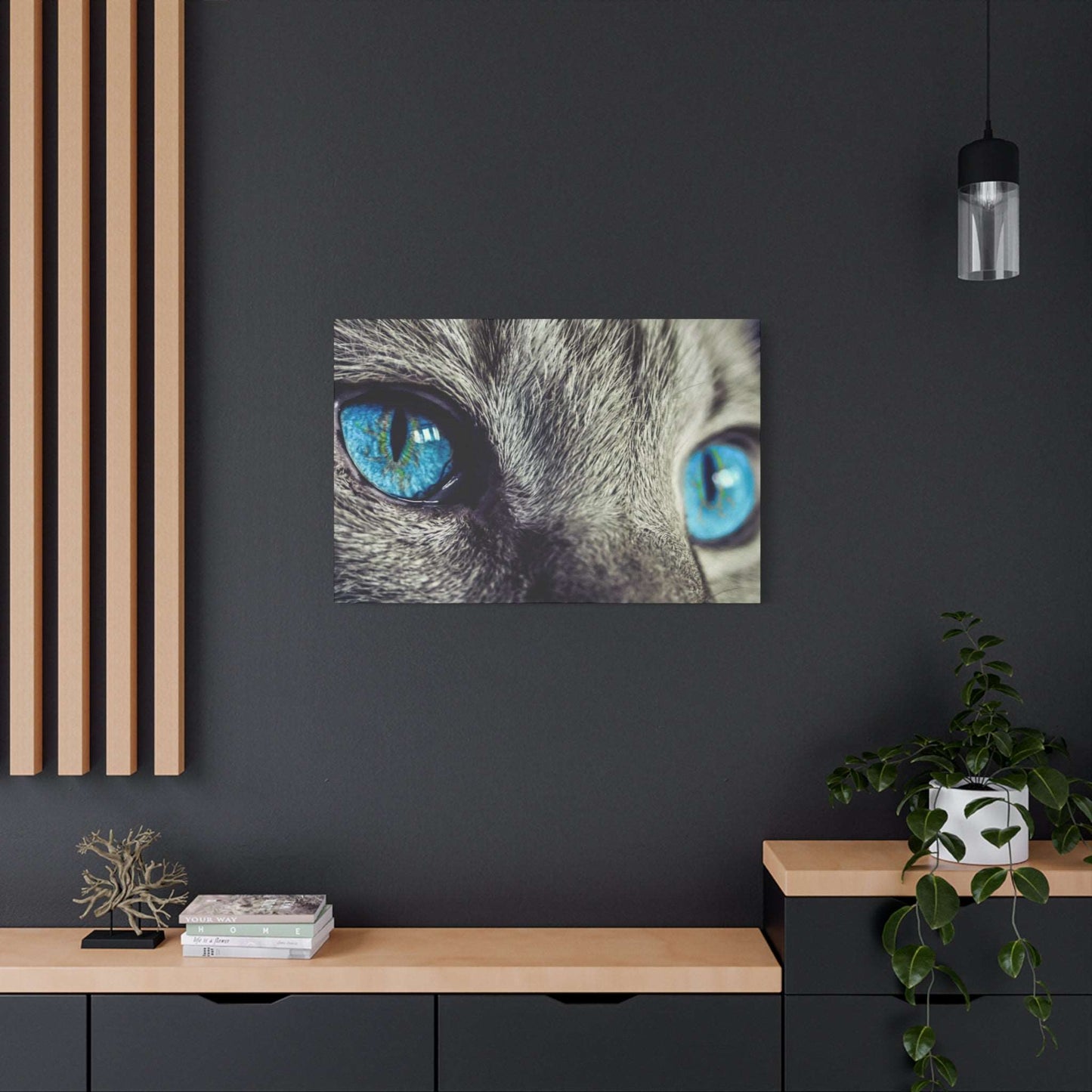 a picture of a cat's blue eyes on a wall