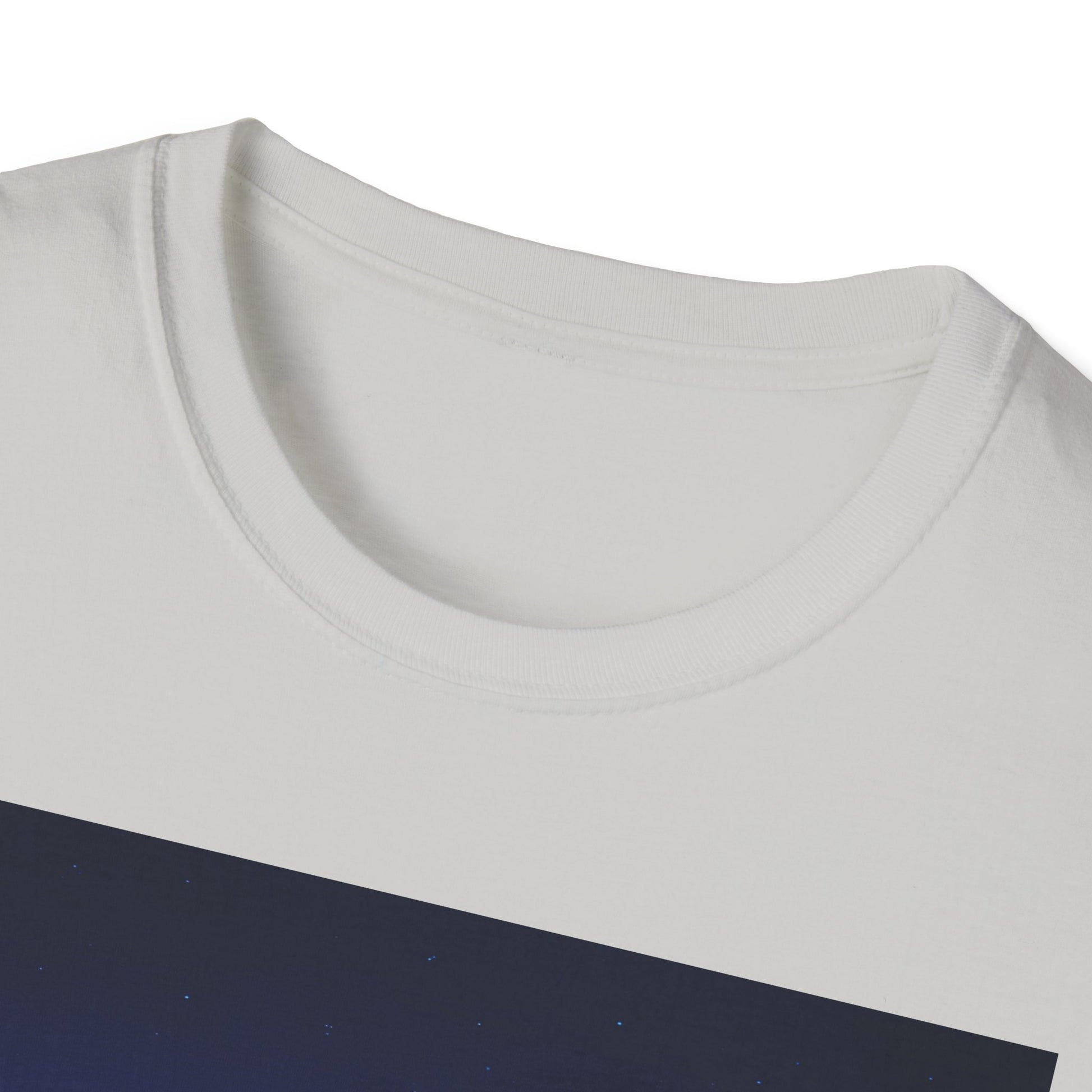 Close-up of a white crew-neck T-shirt featuring a navy diagonal panel with tiny white specks.