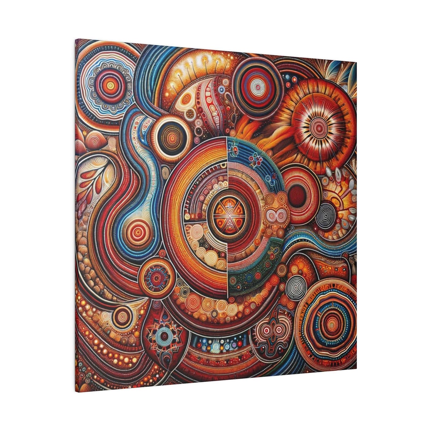 Close-up of a vibrant canvas print with circular, mandala-like patterns in red, orange, blue and gold.
