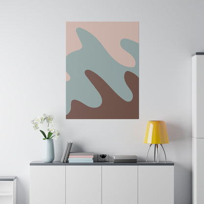 Abstract art canvas print with irregular pastel pink, blue, and brown shapes mounted on a white wall above a sideboard.