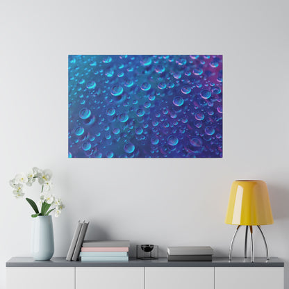 Blue abstract canvas print with bubbles hangs above a gray cabinet, beside a yellow lamp and vase with white flowers.