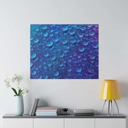 Square wall art featuring blue and purple bubbles, hung above a console table with a vase, books, and a yellow lamp.