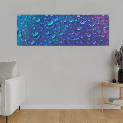 Wide rectangular wall art featuring blue and purple bubbles on a teal to indigo gradient, hung above a light gray wall.