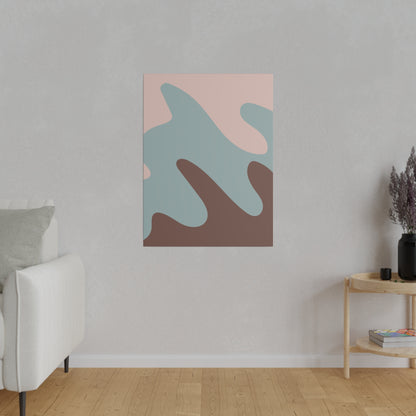 Abstract canvas with pink, teal, and brown organic shapes hangs on a light gray wall above a wooden floor in a living room.
