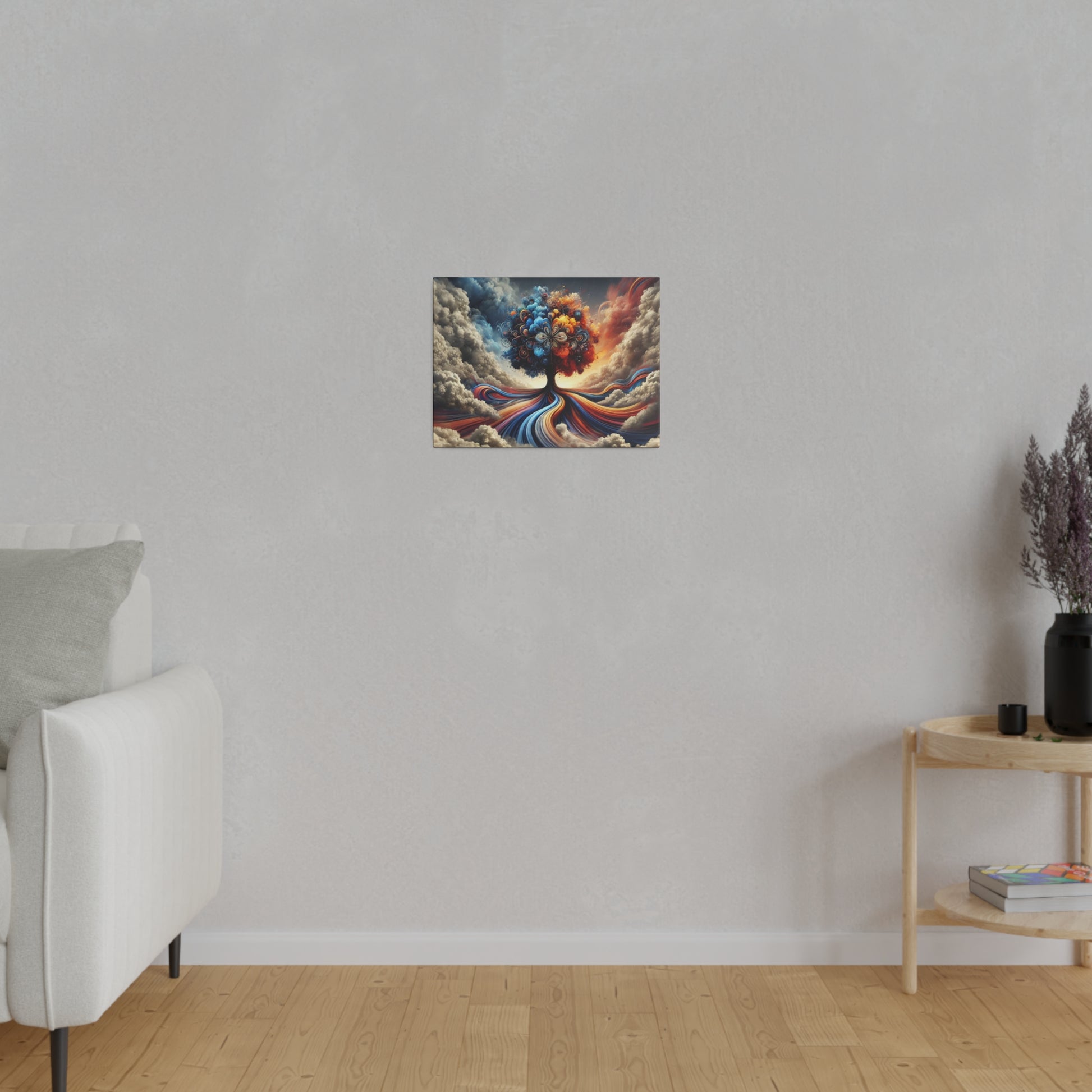 Small colorful abstract painting of a tree with swirling roots mounted on a light gray wall above a white sofa.
