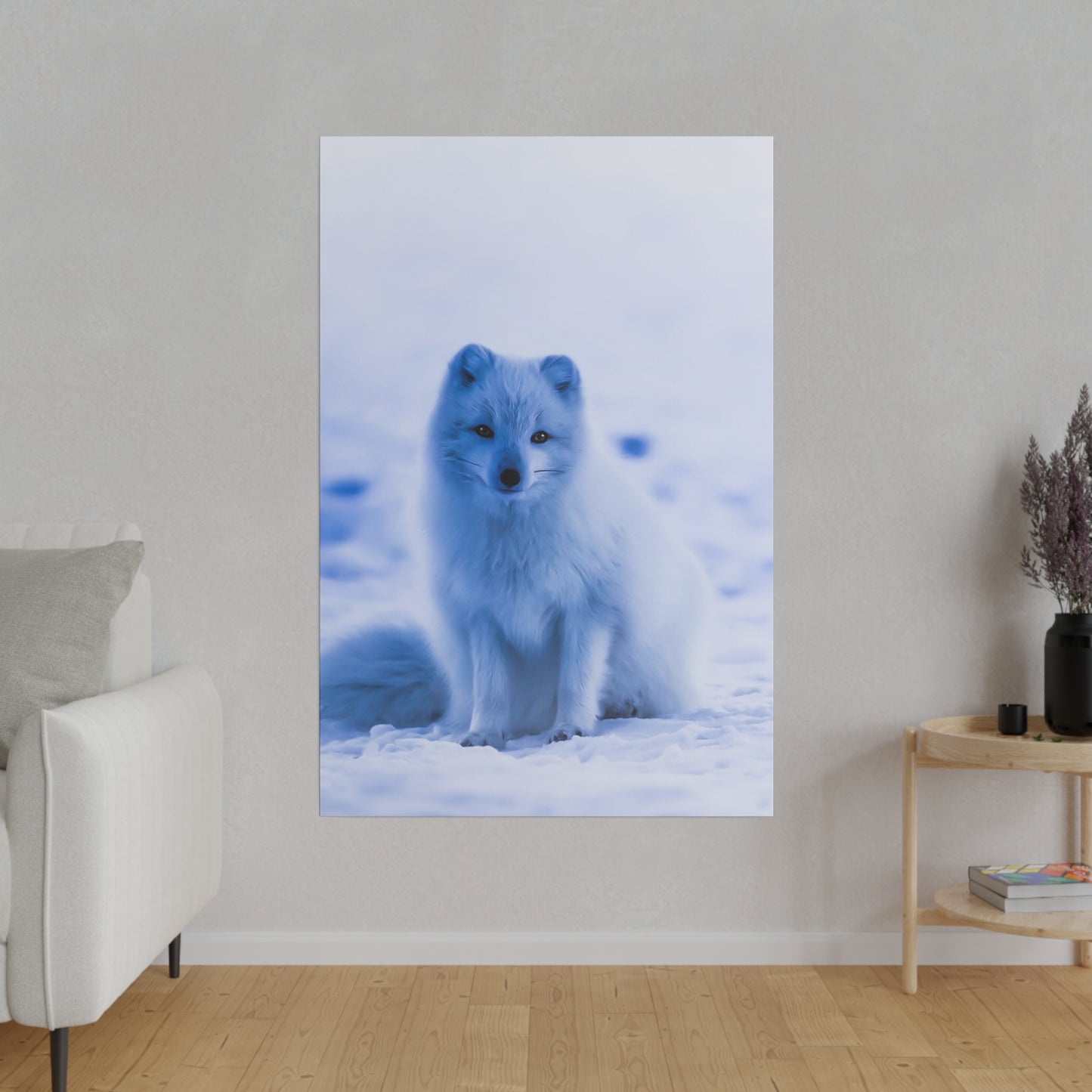 Beautiful winter scene with an Arctic fox, its white fur providing ideal camouflage in the snow-covered landscape.