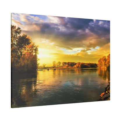 Canvas wall art depicting a calm river at sunset, with golden-orange sky and trees along the banks reflecting in the water.
