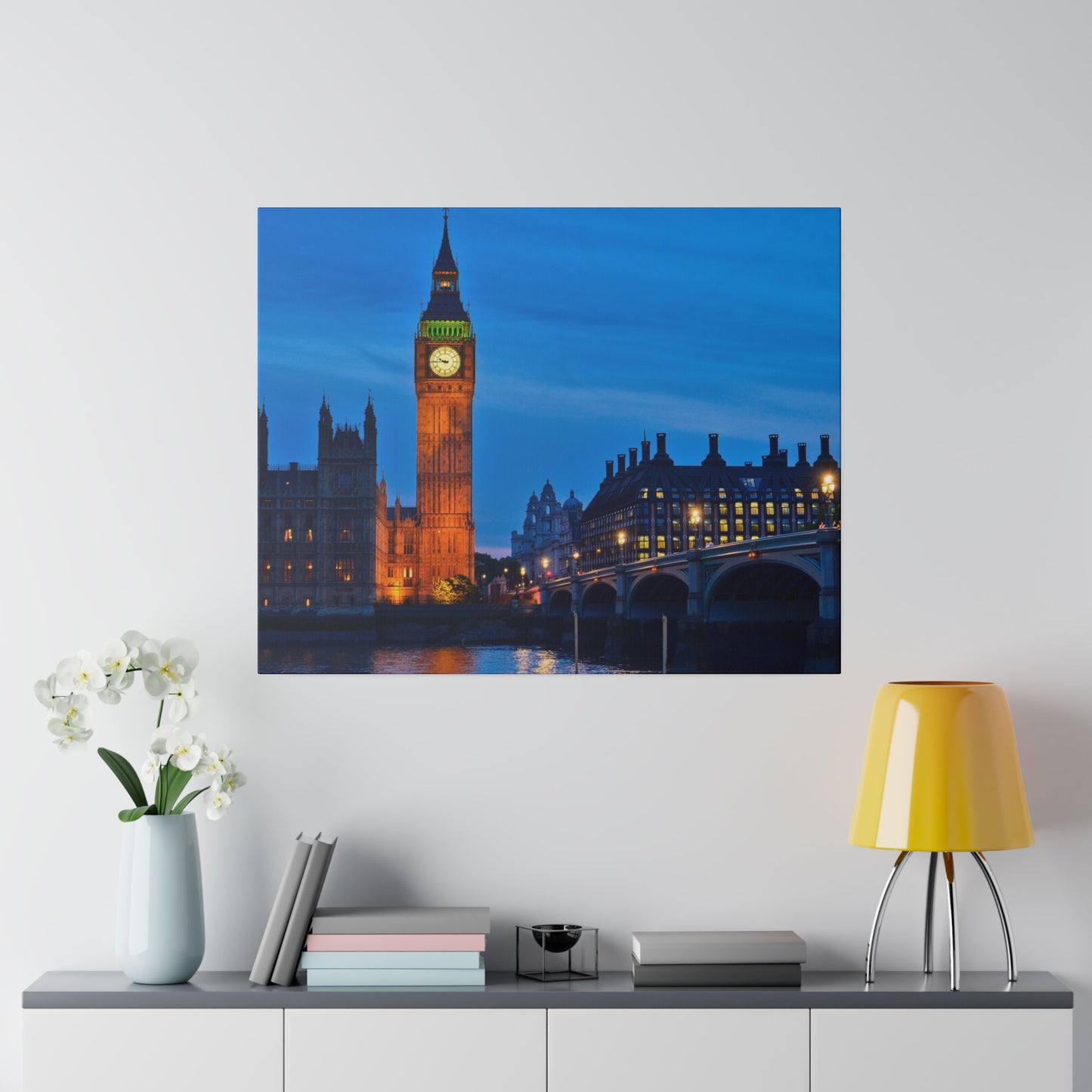 A stunning view of Big Ben illuminated against the night sky in London, highlighting its iconic clock face and the surrounding architecture.