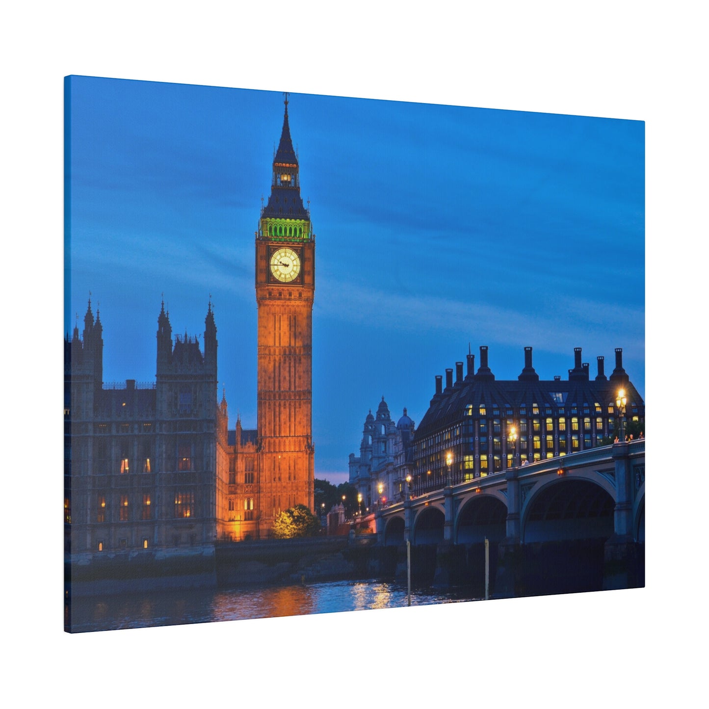 Big Ben illuminated at night with the River Thames in the foreground, creating a serene and picturesque London cityscape.