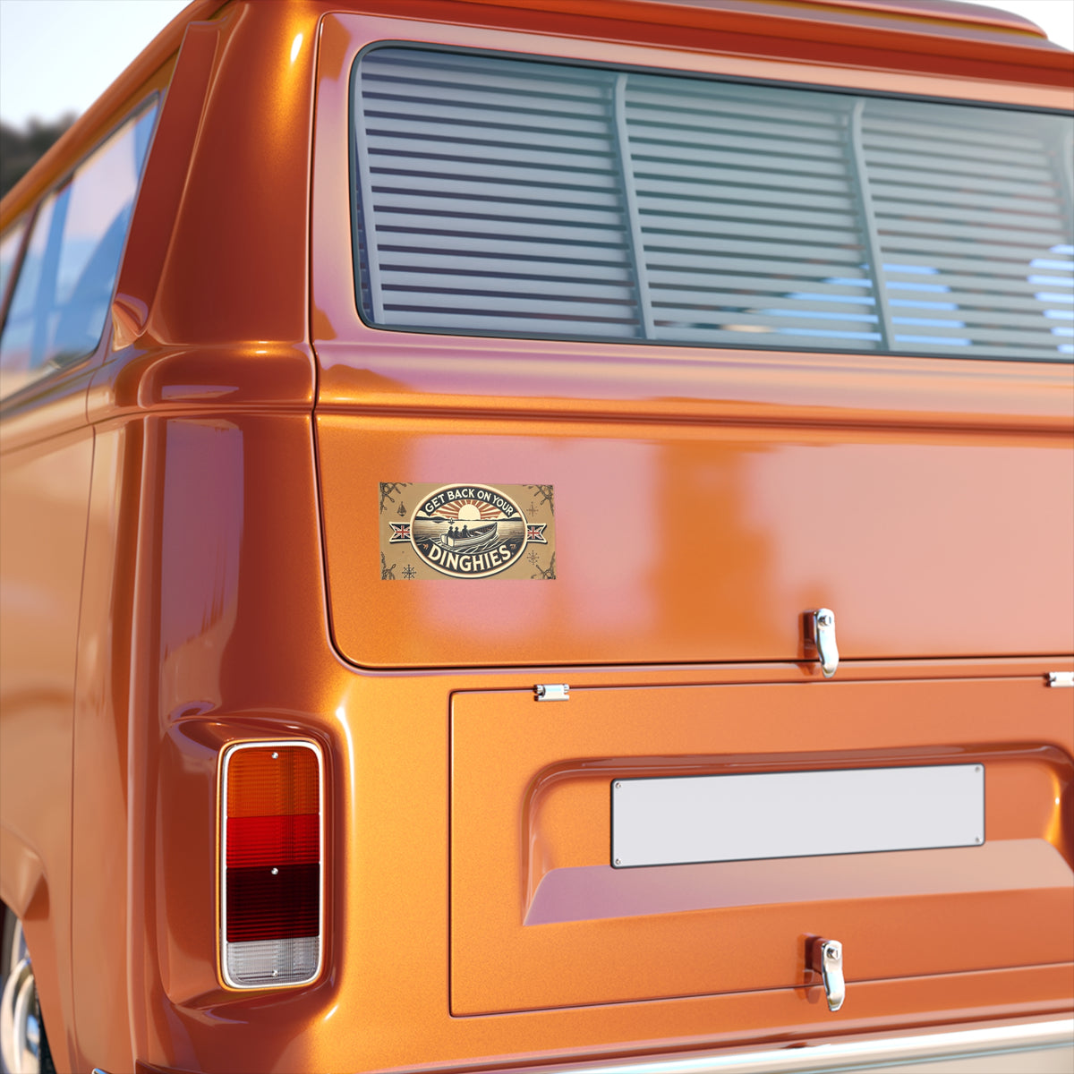 Orange vintage van rear with striped rear window blinds, visible taillight, and a small 'Dinghies' badge sticker.