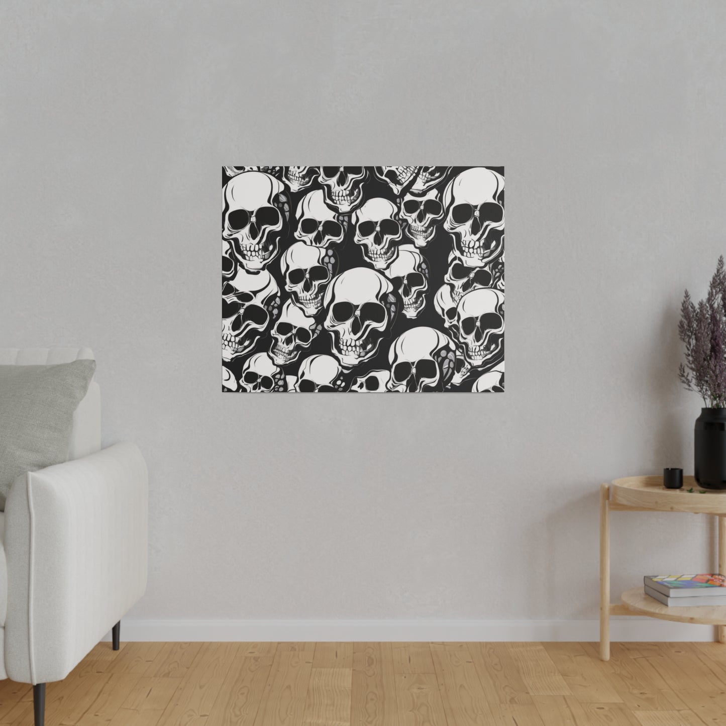 Square wall art print featuring a dense black and white skull pattern mounted on a gray wall.