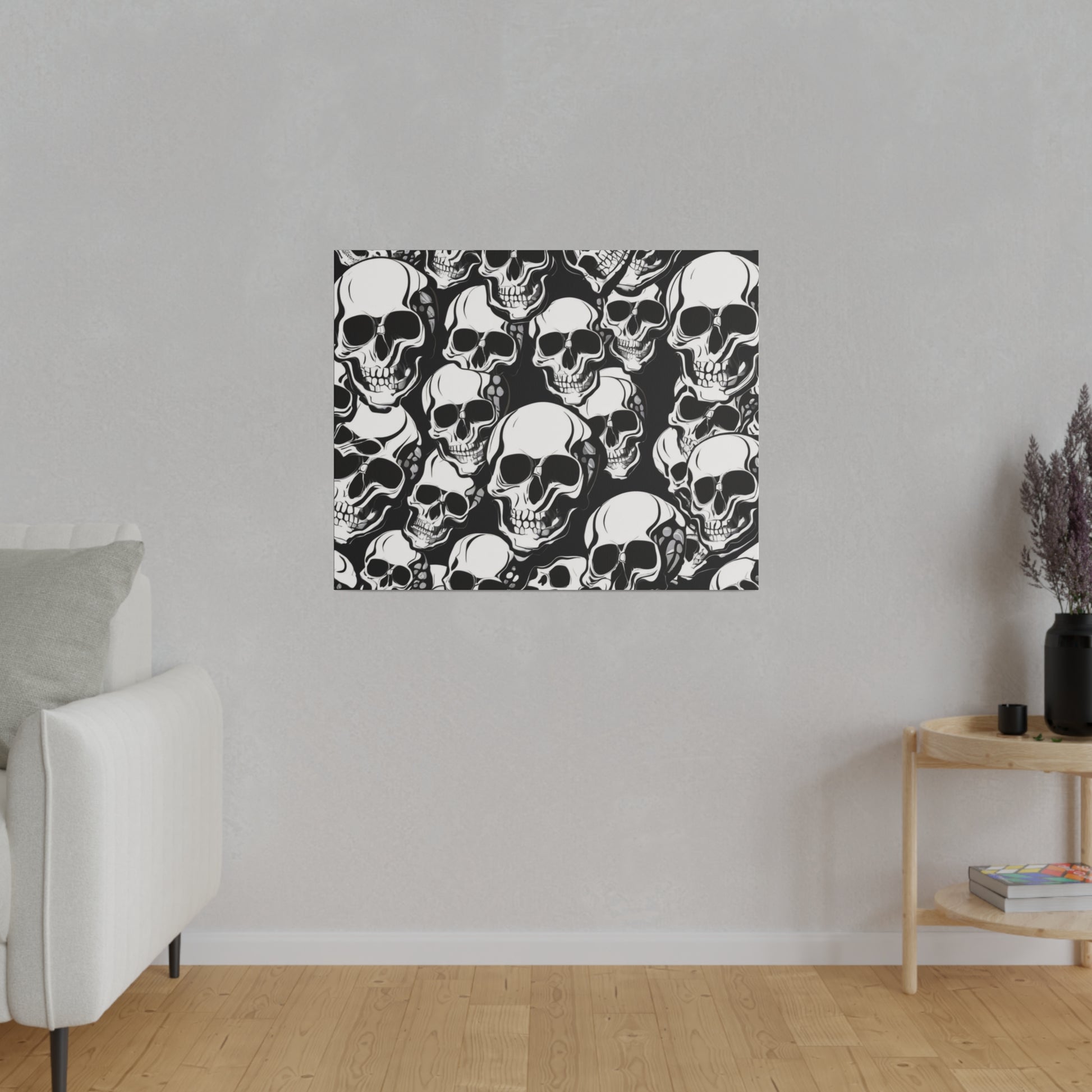 Square wall art print featuring a dense black and white skull pattern mounted on a gray wall.