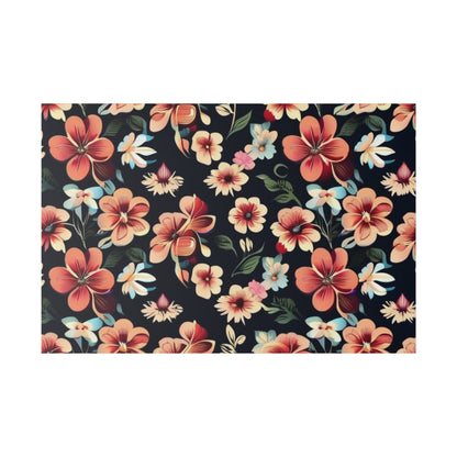 Dark navy fabric covered in a vibrant floral pattern with coral, peach, pink, blue, and green flowers.