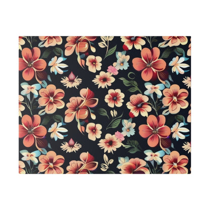 Dark navy fabric with large peach and coral hibiscus-style flowers and green leaves in a tropical floral pattern.