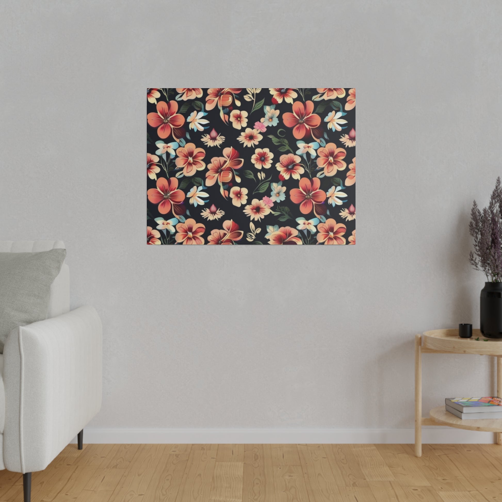 Rectangular wall art with a dark navy background and pink, orange, blue tropical flowers hangs on a light gray wall above a wooden side