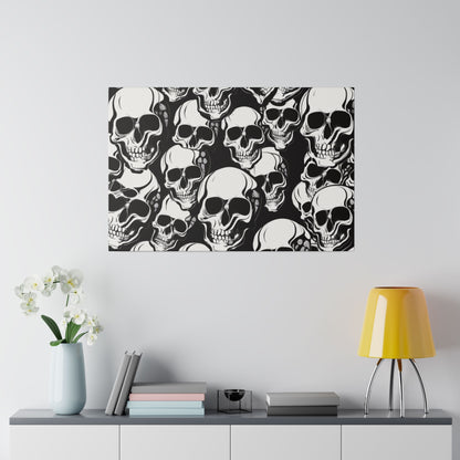 Rectangular canvas wall art with a dense pattern of white skulls on a black background.