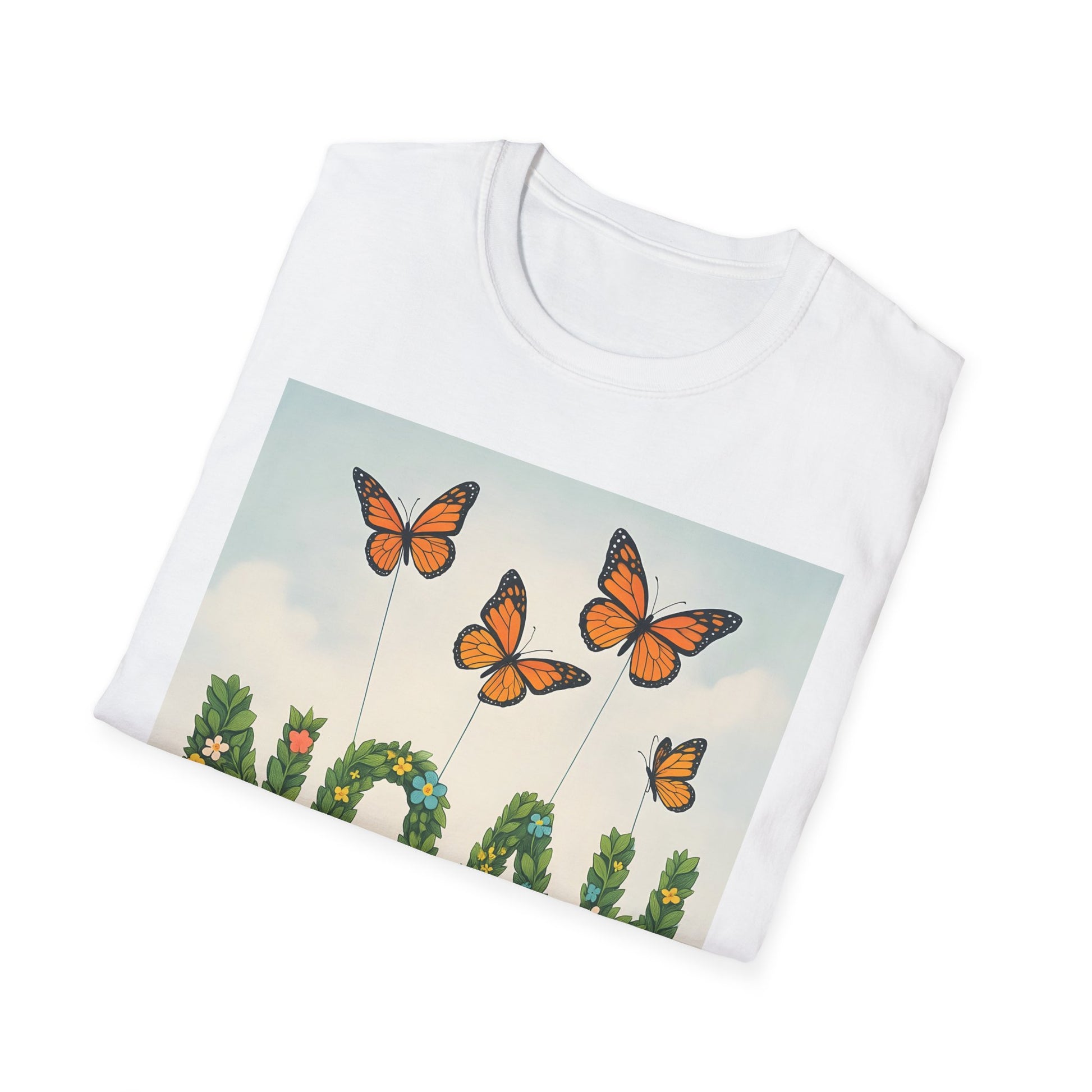 White crew-neck T-shirt featuring a rectangular graphic of orange monarch butterflies perched on green leafy stems against a pale blue sky.