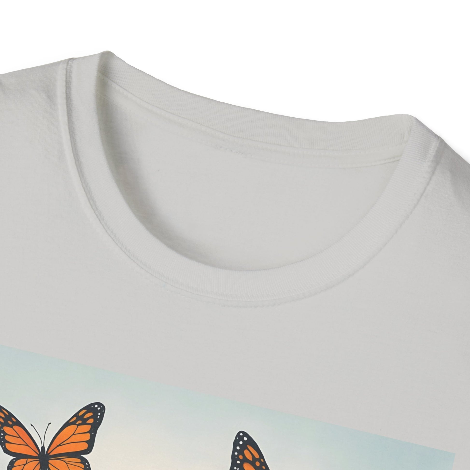 White crew-neck T-shirt featuring a light pastel panel with orange and black butterflies.