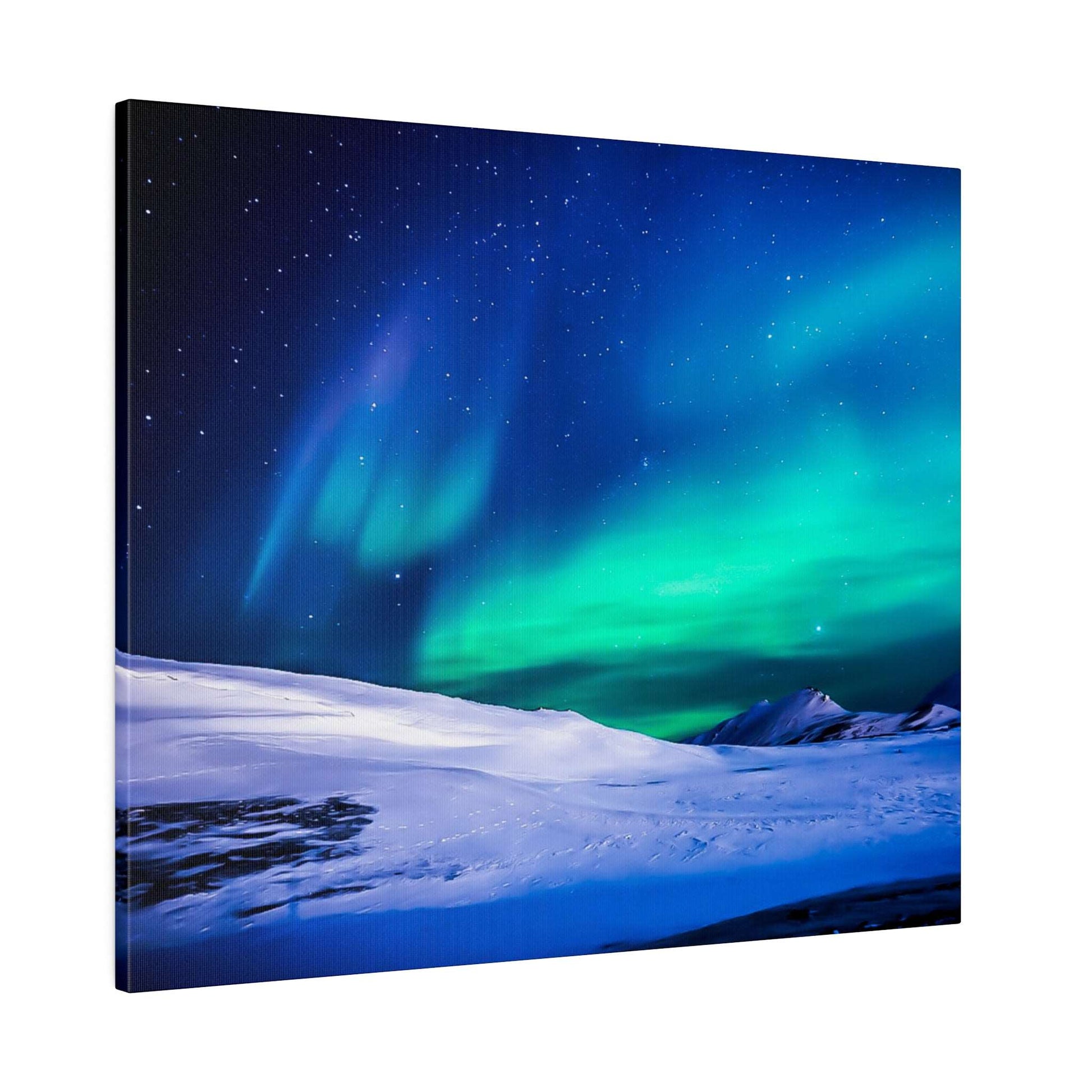 Canvas art showing the northern lights in green and blue across a starry night over a snow-covered landscape.
