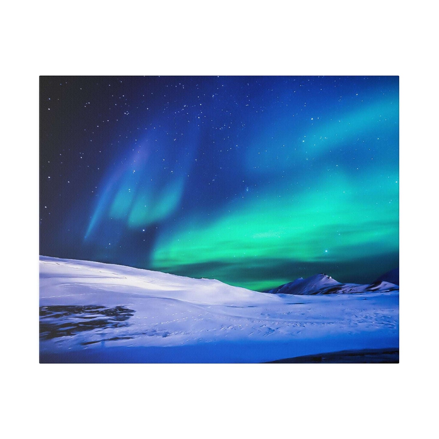 Canvas art depicting the Northern Lights in green and blue hues over a snow-covered landscape under a starry night sky.