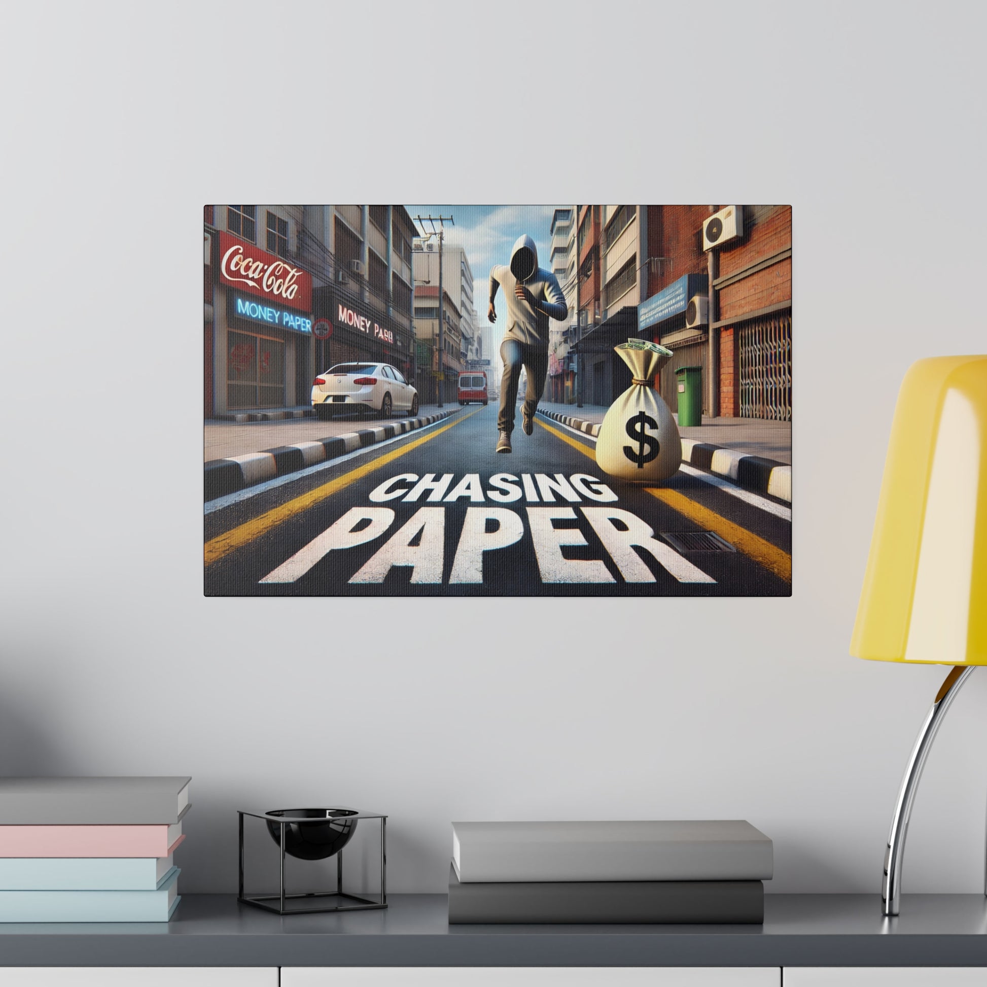 Colorful street scene mural showing a masked man running toward a bag of money on a city road with "Chasing Paper" text.