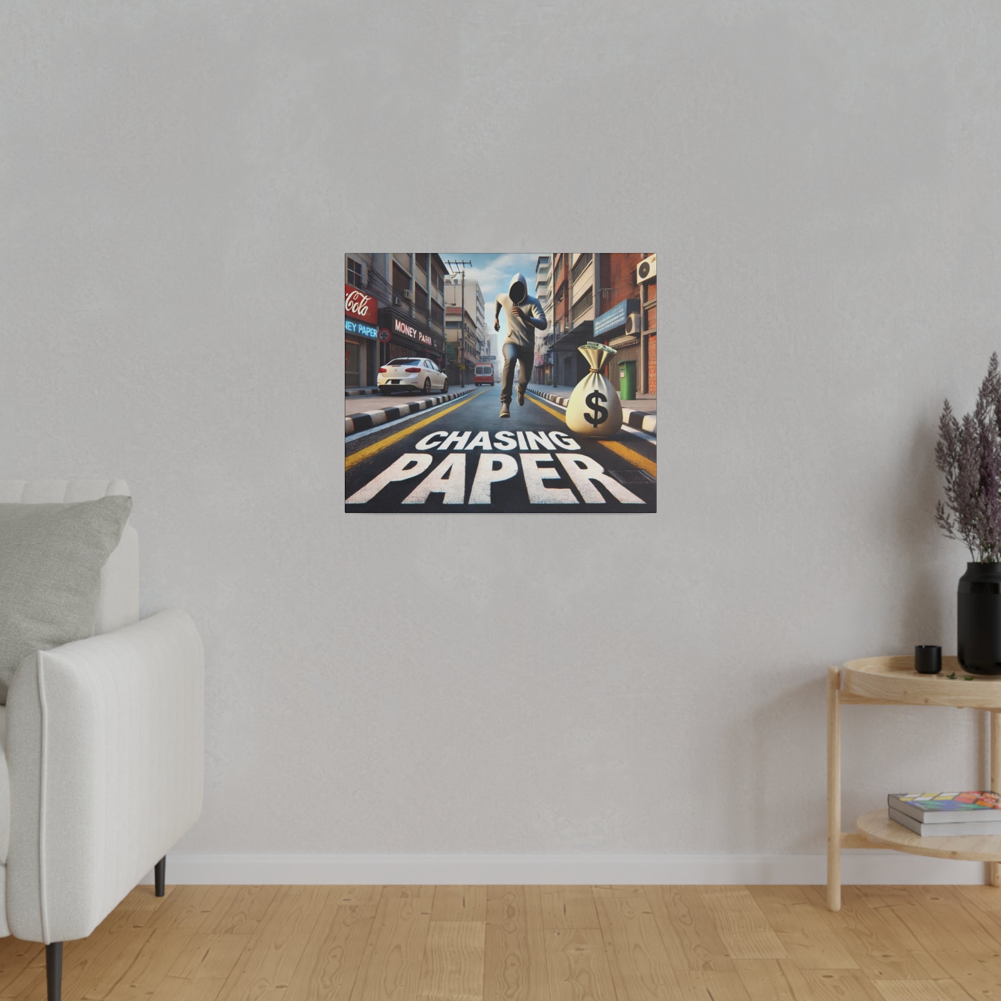 Poster on wall shows a man running down a city street with a money bag and the words "Chasing Paper".