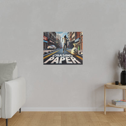 Poster on wall shows a man running down a city street with a money bag and the words "Chasing Paper".