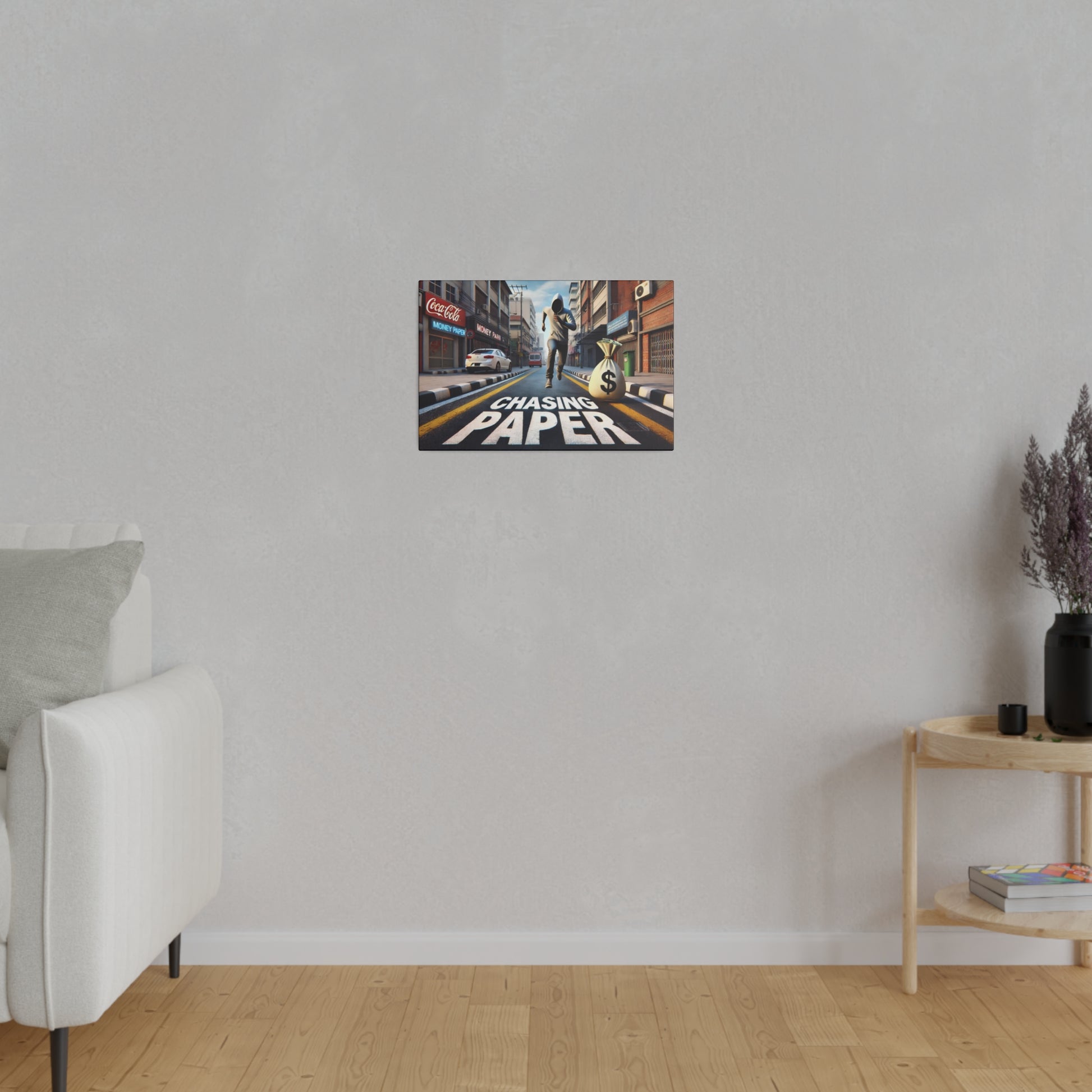 Small wall poster featuring a city street scene with a runner and the words "Chasing Paper.