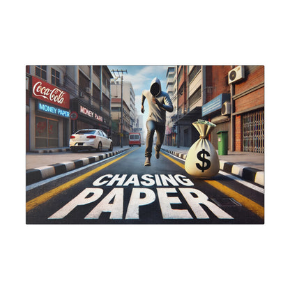 A man in a gray hoodie runs down a city street beside a large money bag, with “CHASING PAPER” painted on the road.