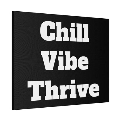 Black canvas wall art with large white bold text reading “Chill Vibe Thrive” arranged in three lines.