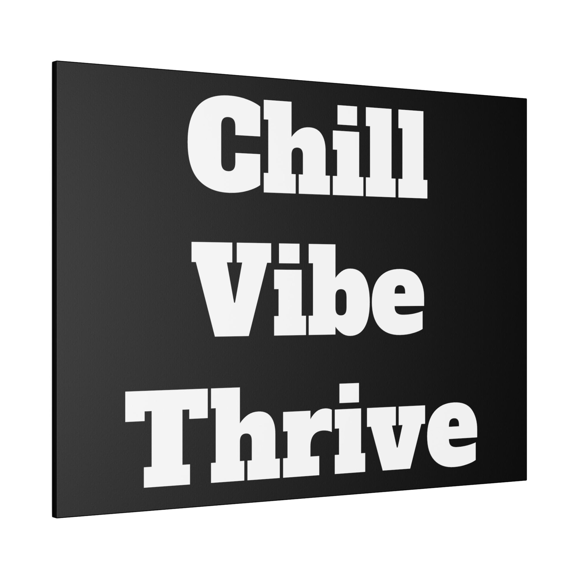 Black square wall art with large white bold text reading “Chill Vibe Thrive” on three lines.