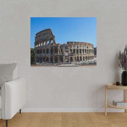 Photo print of the Colosseum in Rome, showing weathered stone arches against a blue sky.