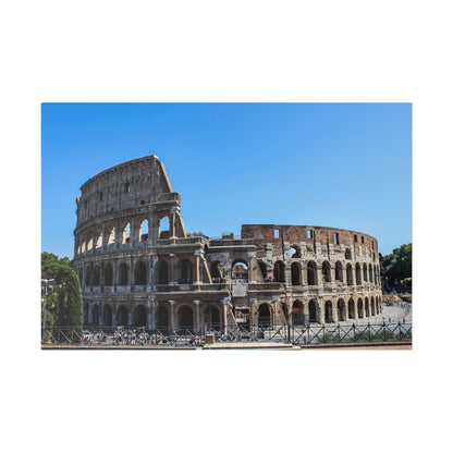Exterior view of the Colosseum in Rome, showing its arched stone façade against a clear blue sky.