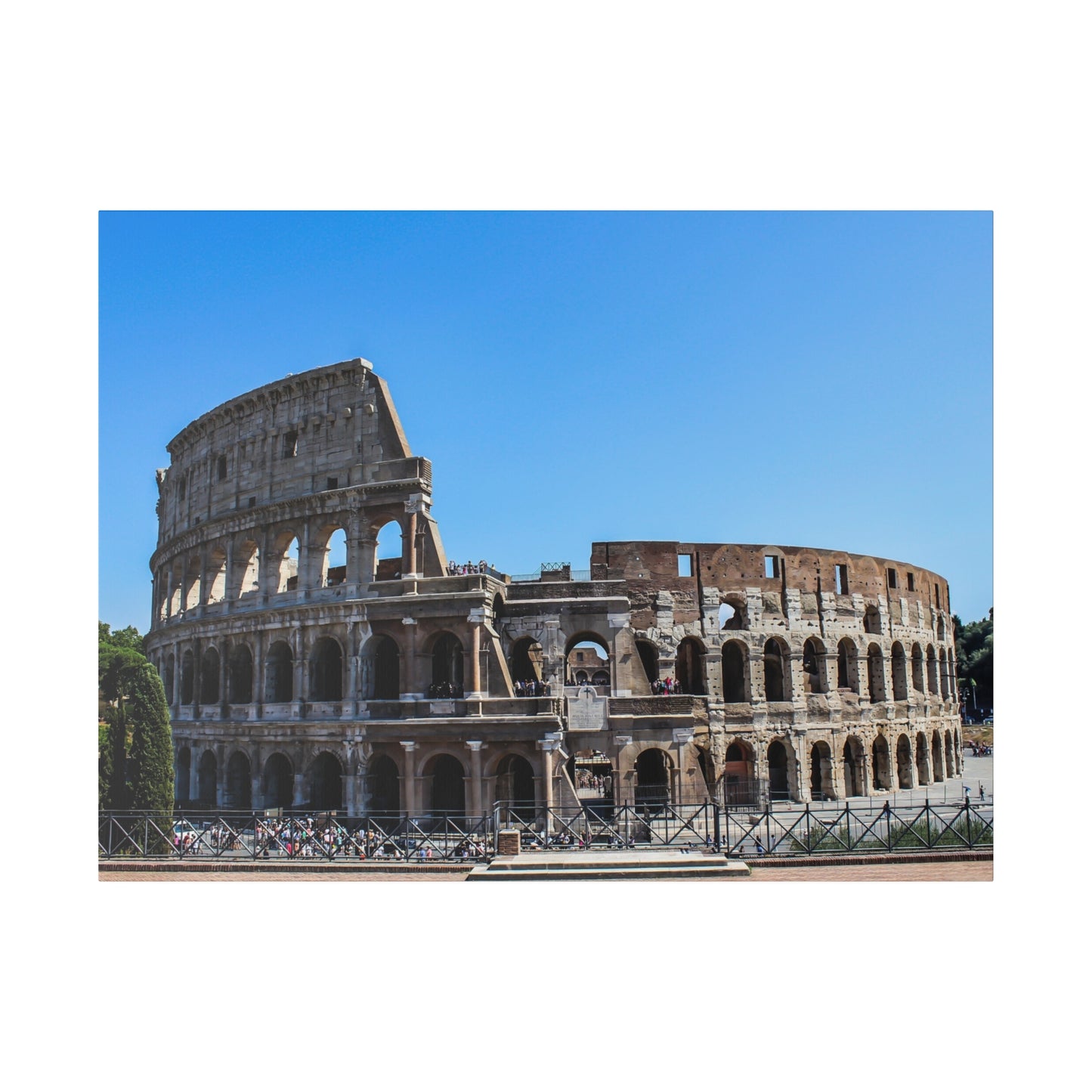 The Colosseum in Rome, Italy, a symbol of Italian heritage and ancient architectural brilliance, under a bright blue sky.