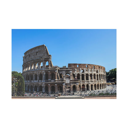 Exterior view of the ancient Colosseum in Rome, stone amphitheatre with arches against a clear blue sky.