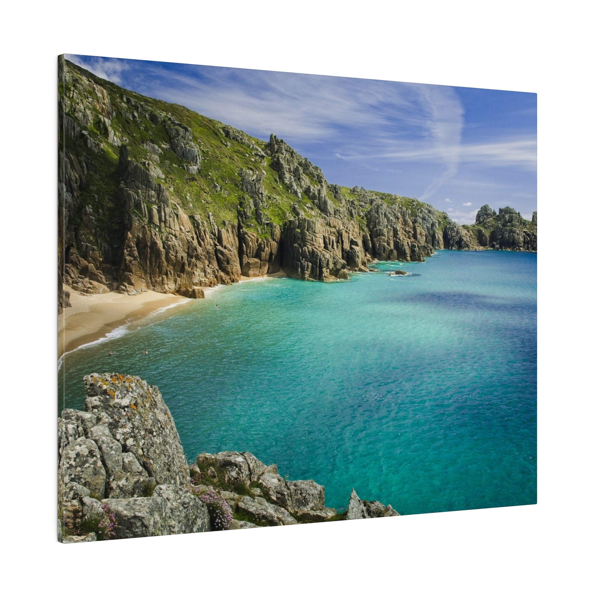 A serene beach in Cornwall showcasing stunning turquoise waters and rugged cliffs, creating a perfect picturesque coastal scene for a tranquil getaway.