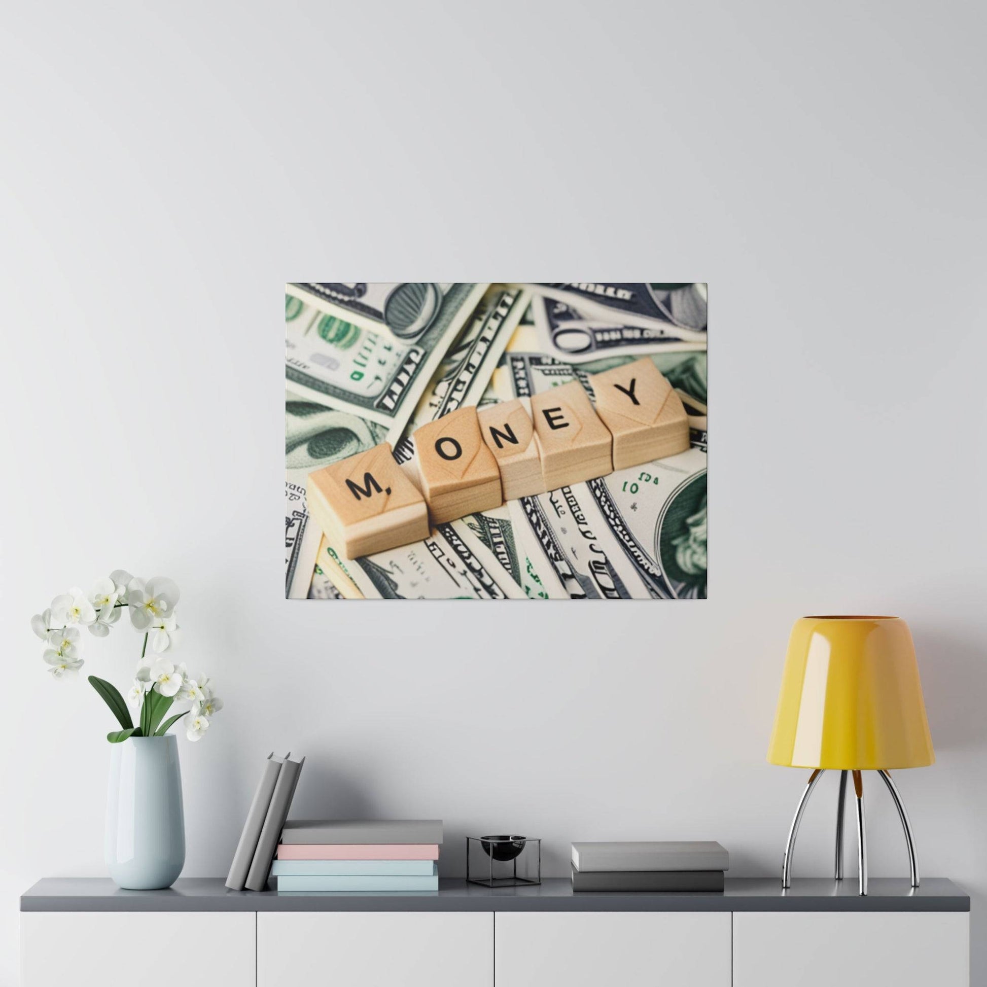 Square wall art showing light wood letter blocks spelling MONEY over a background of U.S. dollar bills.