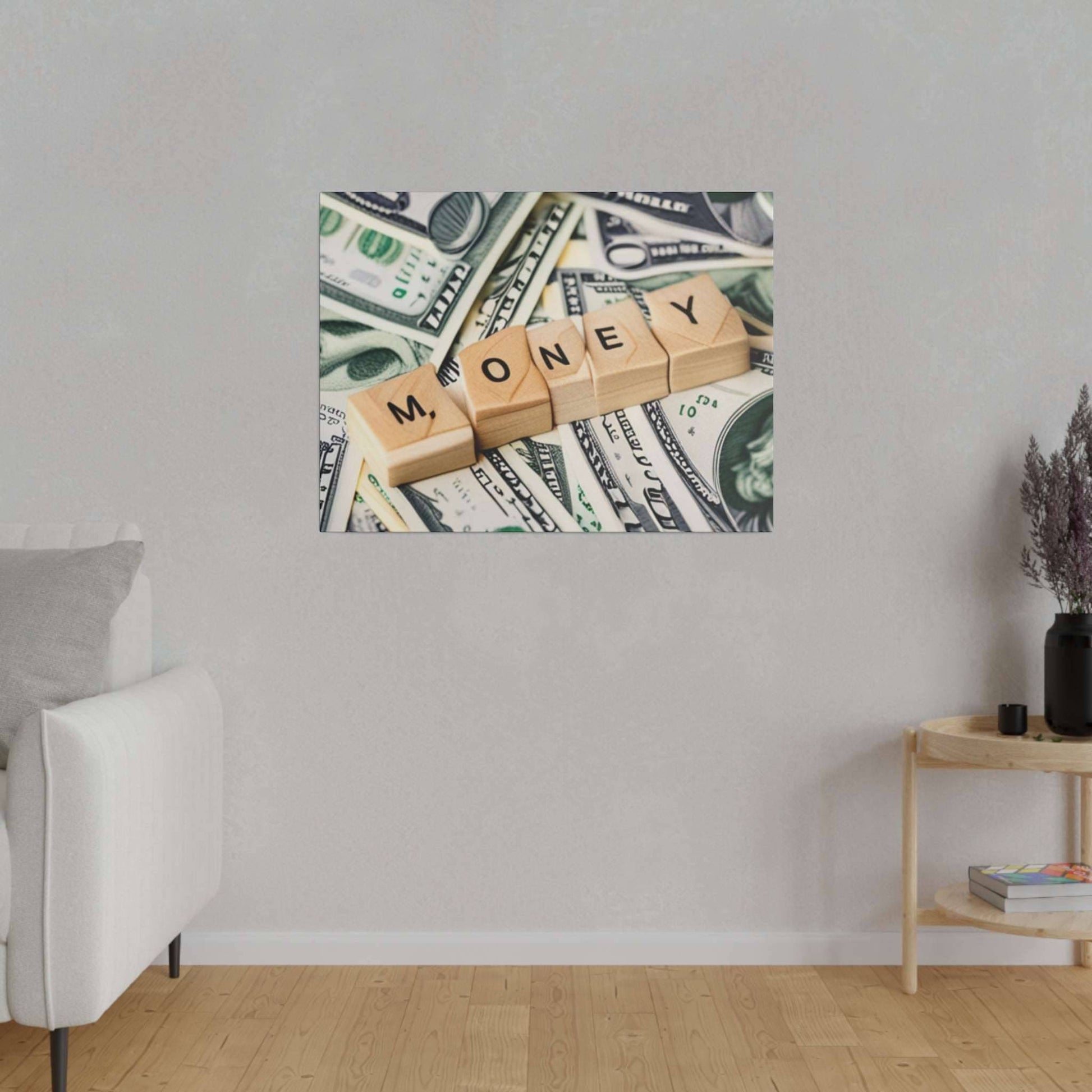Canvas wall art with wooden letter blocks spelling MONEY laid over a background of US dollar bills.