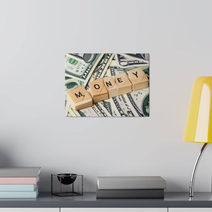 Framed photo on wall showing wooden letter blocks spelling MONEY laid over scattered U.S. dollar bills.