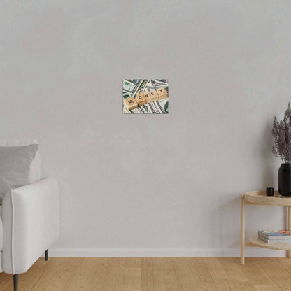 Small square canvas depicting dollar bills with wooden letter tiles spelling 'MONEY' mounted on a light gray wall.
