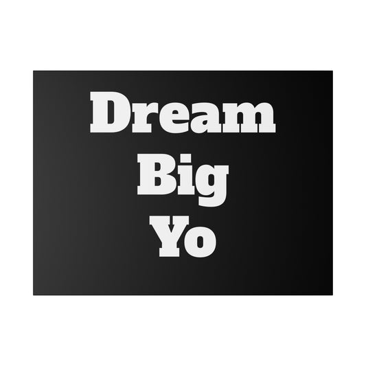 Black card with white bold text reading Dream Big Yo arranged in three stacked lines.