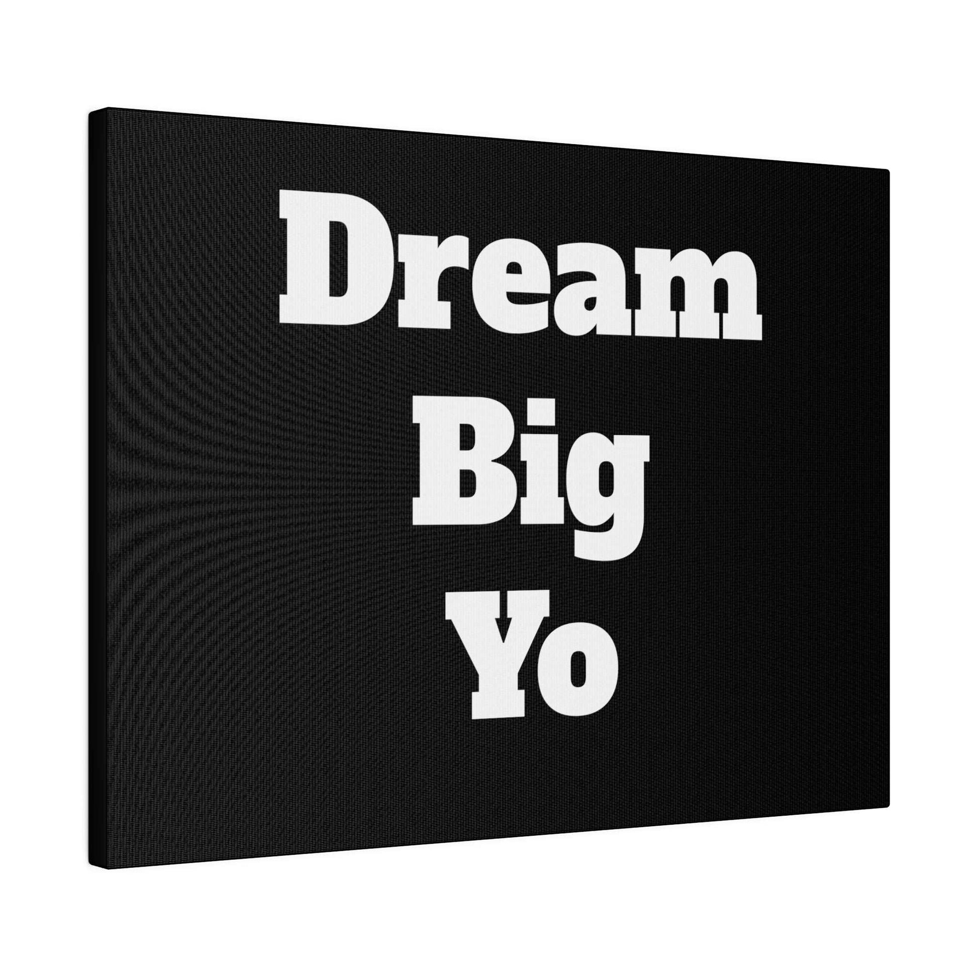 Black canvas wall art with bold white text reading “Dream Big Yo” arranged in three lines.