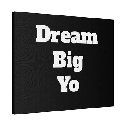 Black canvas wall art with bold white text: “Dream” on top, “Big” in the middle, and “Yo” at the bottom.