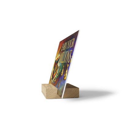 Colorful poster reading "Learn Your Millions" mounted on a light wooden block stand.