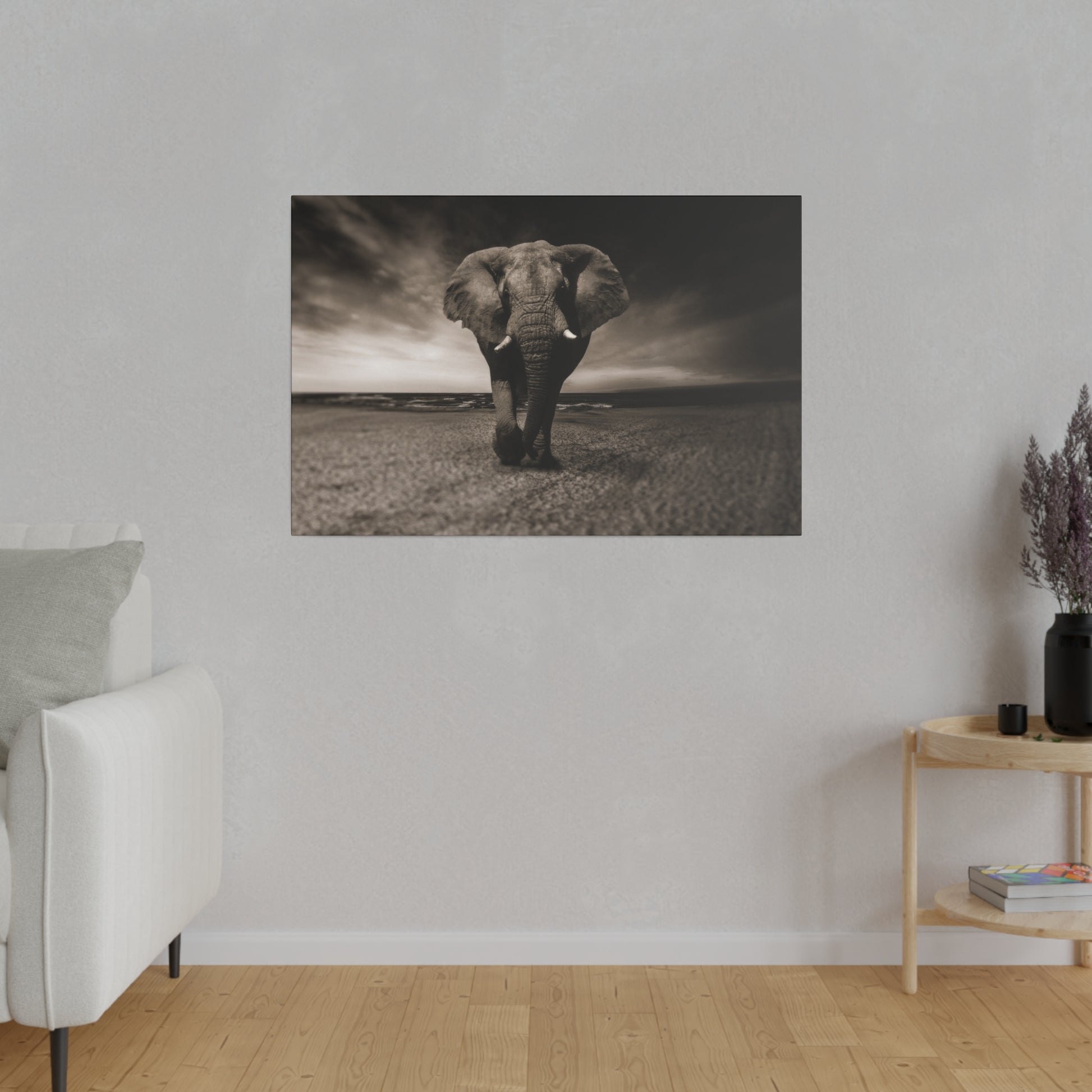 An elephant wandering along the coastal sands, with the horizon and ocean meeting under a cloudy sky, capturing the essence of wild beauty.