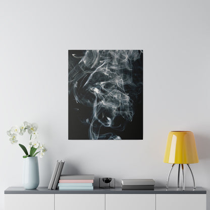Square black canvas with wispy white smoke patterns hangs on a white wall above a gray sideboard with a light blue vase of white flowers